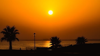 sunset, silhouette, beach, seaside, coast, sun, sunlight, orange Sky, landmark, destination, resort