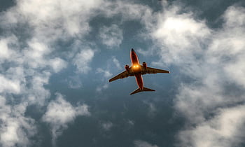 flying plane, airplane in flight, cloudy sky, travel, aviation, in-flight, scenic sky, aircraft, jet plane, air travel, commercial airplane
