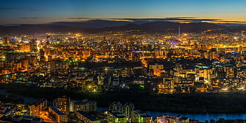 aerial photography, city buildings, night view, vibrant lights, skyline, urban landscape, illuminated city, aerial view, cityscape, night photography, city lights