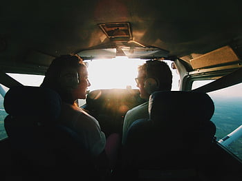 pilots, cockpit, sunrise, adventure, travel, plane, flying, man and woman, talking, inside plane, aviation