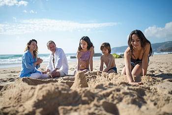 family, beach, sand castle, sunny day, Portugal, building sandcastles, enjoying beach, family time, seaside activity, vacation, outdoor fun