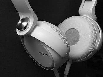 Sony, white headphones, black and white photo, close-up, Sony headphones, white earphones, audio equipment, music listening, tech gadgets, headphone design, sound technology