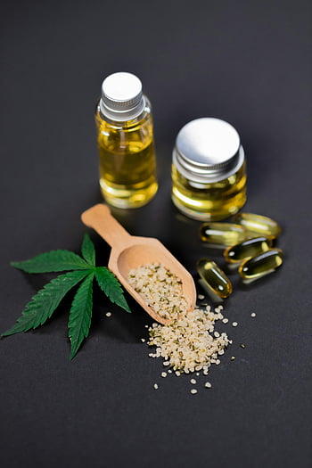زيت القنب،  بذور القنب،  كبسولات،  ماريجوانا الأطعمة،  خلفية داكنة،  وضع مسطح،  ورقة القنب،  منتجات Cbd،  المكملات الطبيعية،  الفوائد الصحية،  الطب البديل