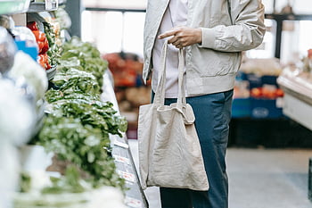 grocery store, fresh vegetables, eco-friendly bag, man shopping, supermarket, greens, unrecognizable customer, selecting vegetables, reusable bag, healthy eating, produce section