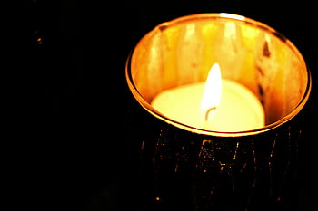 flame, white tealight candle, glowing candle, decorative holder, warm atmosphere, cozy atmosphere, close-up candle, candlelight, candle holder, warm glow, cozy glow