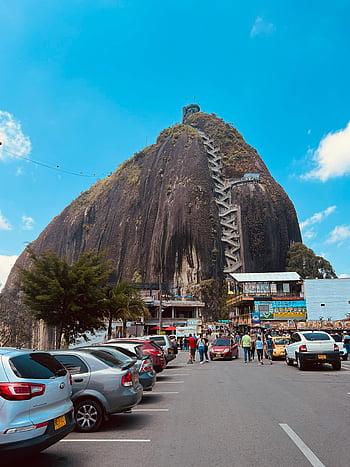 Rock of Guatapé, El Peñón de Guatapé, Colombia, rock formation, parking area, Guatapé, natural landmark, tourist attraction, outdoor scenery, travel destination, South America