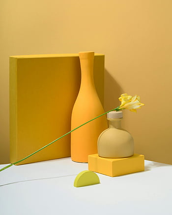 yellow bell flower, small bottle, minimalist still life, yellow vases, flowers, gradient background, yellow decor, modern art, still life photography, yellow aesthetic, contemporary design