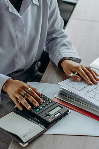 accountant, calculates finances, calculator, documents, desk, working, financial documents, office work, business person, financial planning, paperwork