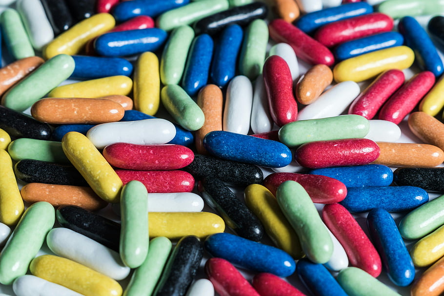 colorful candy pills, vibrant collection, assorted colors, sweet treat, colorful background, plastic candy, assorted plastic, colorful pills, candy background, assorted candy, vibrant candy