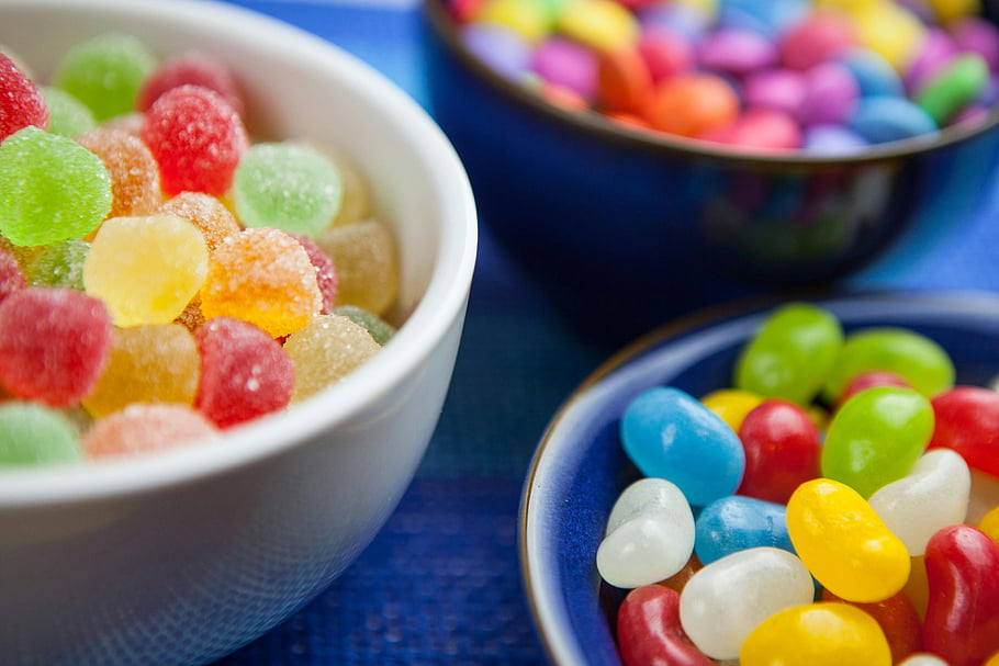 Candy Lot, colorful jelly beans, sugar-coated gumdrops, decorative bowls, vibrant assortment, sweet-themed designs, colorful candies, assorted candies, candy bowls, sweet treats, candy display