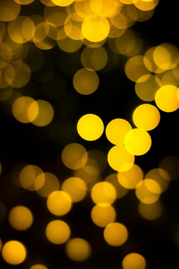 žlutý bokeh, rozmazané světla, tmavé pozadí, abstraktní obraz, zářivé barvy, žluté kruhy, bokeh efekt, noční světla, Rozostřená světla, abstraktní umění, bokeh fotografie