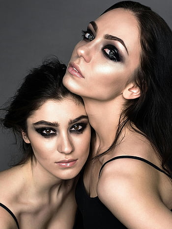women, expressive eye makeup, bold makeup, studio portrait, striking, posing, expressive eyes, beauty, fashion, makeup artistry, black and white