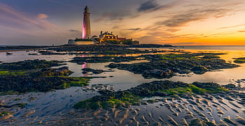 White Lighthouse, St Mary's Lighthouse, Tyne and Wear, sunset, reflections, coastal scenery, lighthouse view, beach landscape, natural beauty, evening light, rocky shore