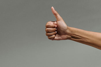 thumbs up, hand gesture, close-up image, neutral background, positive sign, approval sign, human hand, gesture photography, like sign, okay gesture, hand signal
