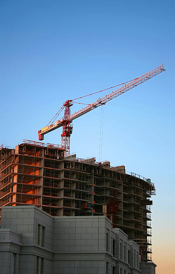 tower crane, high-rise building, construction site, modern urban development, sunset, daytime, building construction, construction equipment, urban construction, construction industry, construction site photography