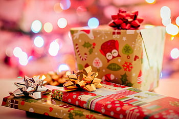 Christmas gifts, brown gifts, red gifts, holiday presents, gift wrapping, festive decorations, Christmas bows, wrapped presents, holiday season, gift boxes, Christmas lights