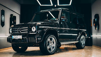 mercedes, Black Mercedes SUV, Moderní vnitřní nastavení, elegantní auto, luxusní vozidlo, Displej vnitřního vozu, mercedes g-class, špičkový automobil, elegantní design, Vnitřní showroom, černá suv