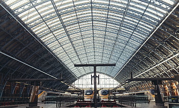 train station, railway station, trains, glass roof, station platform, train travel, transportation hub, modern trains, station architecture, train tracks, station interior