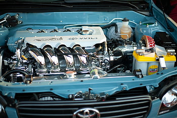 clean car engine, shiny Toyota engine, powerful engine, automotive engineering, detailed engine view, car engine details, Toyota engine, engine showcase, car engine components, engine maintenance, engine performance