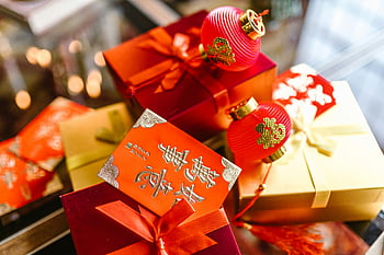 Red and Gold Gift Boxes, Chinese New Year, colorful gift boxes, red packets, lanterns, celebration, festive decorations, holiday gifts, traditional Chinese, red and gold, gift wrapping