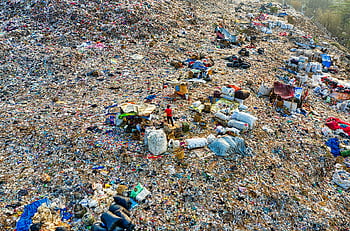 landfill, aerial shot, environmental damage, scattered trash, bird's eye view, waste management, pollution, garbage dump, plastic waste, waste site, environmental issues
