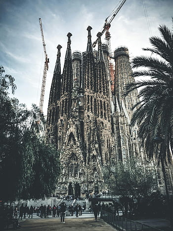 Sagrada Familia, Gothic basilica, Barcelona, uncompleted, majestic, tall spires, construction cranes, towering spires, Spain, Antoni Gaudi, cathedral