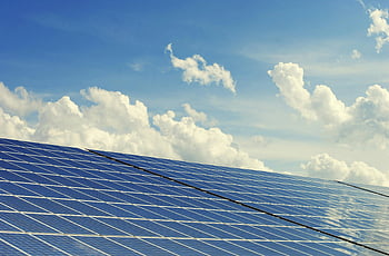 blue solar panel, modern solar panels, vibrant blue sky, clean energy, solar energy, blue sky clouds, sleek design, renewable energy, solar technology, eco-friendly, sustainable energy