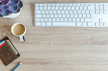cup of coffee, keyboard, wooden desk, minimalist workspace, clean workspace, coffee cup, desk top, wallet, pencil, succulent plant, white keyboard