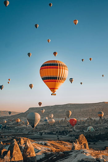 hot air balloons, Cappadocia, Turkey, sunrise, majestic view, flying balloons, mountain landscape, sky, travel destination, tourist attraction, aerial view