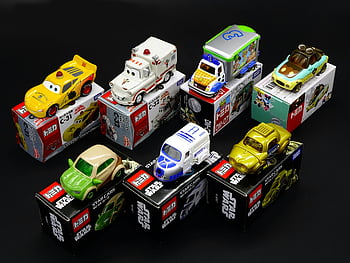 Tomica Cars, die-cast toy cars, Star Wars, Disney, vibrant display, collectible cars, toy car collection, Star Wars toys, Disney toys, Tomica collection, die-cast collection