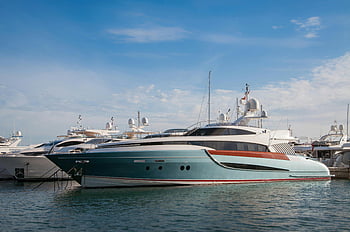 White and Blue Cabin Boat, sleek yachts, serene marina, bright blue sky, docked boats, luxury yachts, marina scene, yacht collection, calm water, boat dock, yacht exterior