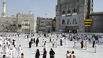 Masjid al-Haram, Great Mosque of Mecca, Muslim pilgrims, sacred site, Islamic architecture, Mecca, Hajj, Umrah, religious gathering, Saudi Arabia, white clothing