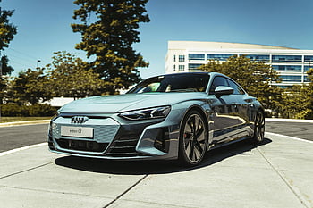 Audi e-tron GT, silver car, electric car, modern urban area, clear skies, luxury car, parked car, Audi, e-tron GT, urban setting, electric vehicle