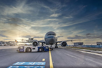 airplane, runway, airport, tarmac, aircraft, vehicle, truck, airliner, clouds, asphalt, jet
