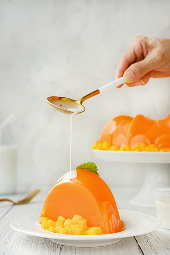mango jelly, pouring cream, fruit jelly, dessert topping, food photography, close-up dessert, mango dessert, sauce topping, jelly dessert, food enthusiasts, cream sauce