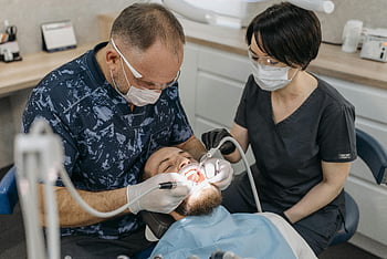 dentist, dental assistant, patient, dental exam, protective gear, dental office, dental procedure, dental care, dental hygiene, dental treatment, dental chair