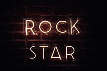 neon sign, Rock Star, brightly lit, dark background, brick wall, vibrant retro, illuminated lights, neon lights, retro vibe, night scene, signage