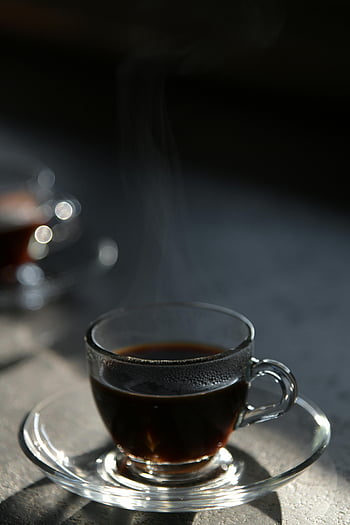 clear glass mug, brown liquid, steaming coffee, black coffee, glass cup, saucer, close-up, hot beverage, coffee cup, steam, drink
