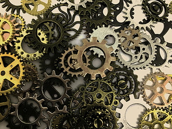 assorted-color gears, close-up view, interlocking gears, intricate industrial design, precision, mechanical components, metallic gears, steampunk style, industrial art, mechanical art, gear assembly