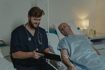 Læge i skrubber, hospitalsseng, Nasal kanyle, tablet, sundhedstjek, patientpleje, Medicinsk professionel, Indstilling af sundhedsvæsenet, Bed om pleje, medicinsk teknologi, Patientovervågning