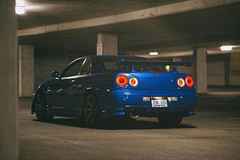 Blue Nissan Skyline GT-R, podzemní garáže, Sportovní design, prázdné parkoviště, zpětný pohled, auto, modré auto, výkonné vozidlo, automobilového průmyslu, noční scénu, poznávací značka