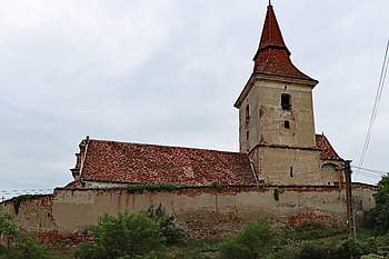 Agarbiciu, fortified church, Virgin Mary, 15th century, Gothic basilica, defensive tower, oval fortification, Michael Groß, Samuel Joseph Maetz, pyramidal roof, medieval bells