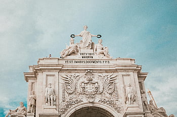 Rua Augusta Arch, Lisbon, historic architecture, low angle view, iconic landmark, Portugal, stone sculpture, archway, European history, cityscape, travel destination
