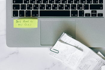tax reminder, laptop, sticky note, receipts, tax season, organization, computer keyboard, financial planning, tax preparation, office desk, marble surface