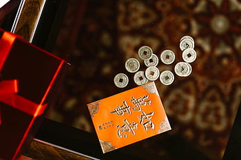 roter Umschlag, chinesische Münzen, der Wohlstand, Chinesisches Neujahr, Angpao, finanzielles Glück, Glück, Wohlstandsymbol, Tradition, festlich, kulturell