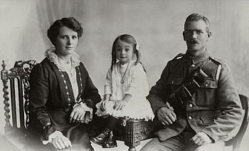 vintage family portrait, military uniform, period attire, classic family photo, military man, family portrait, vintage photo, military family, historical portrait, old family photo, military officer