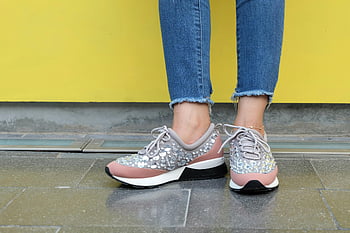 close-up shoes, stylish sneakers, sequins, blue denim, yellow background, fashion footwear, casual style, women's shoes, street style, glitter sneakers, denim jeans