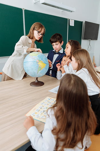 teacher, geography lesson, classroom, globe, students, education, learning, teacher discussing, exploring geography, school, children