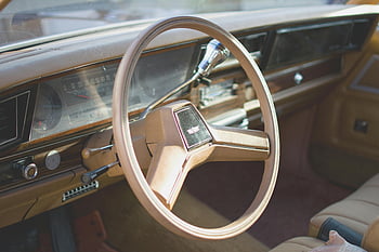 vintage car interior, wooden dashboard, classic steering wheel, yellow car, detailed view, retro car, car dashboard, car interior, steering wheel, vintage car, classic car