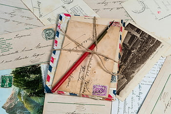 vintage postcards, letter envelopes, old stamps, pen, twine, collection, handwriting, antique mail, postcard collection, vintage correspondence, nostalgic letters